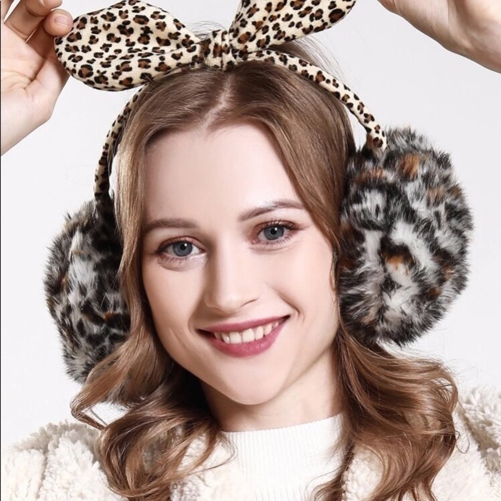 Leopard animal print bow earmuffs. NWT.